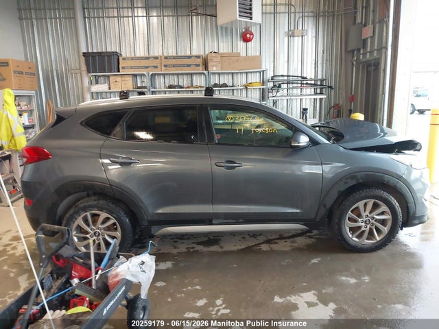 KM8J3CA4XHU304693 Hyundai Tucson