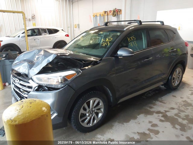 KM8J3CA4XHU304693 Hyundai Tucson