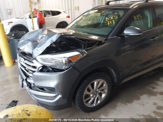 KM8J3CA4XHU304693 Hyundai Tucson