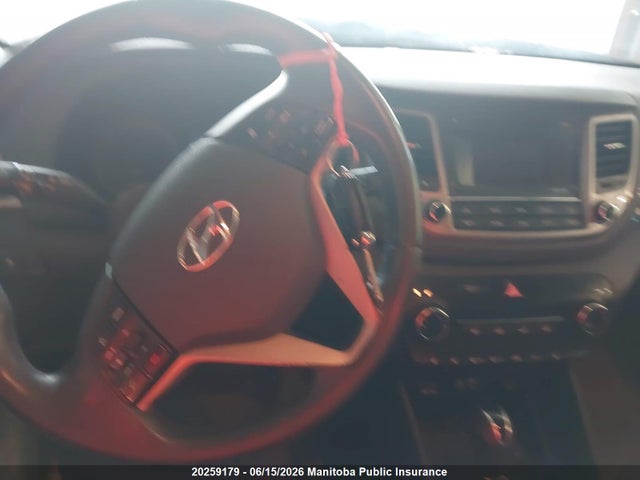KM8J3CA4XHU304693 Hyundai Tucson