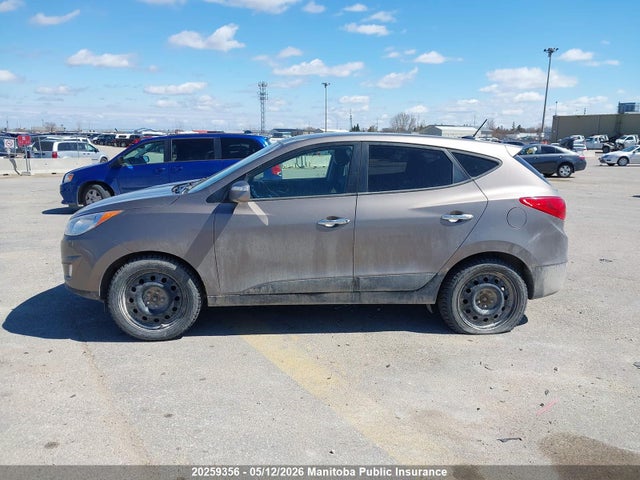2011 Hyundai Tucson Limited მანქანა იყიდება აუქციონზე, vin: KM8JUCACXBU147257, აუქციონის ნომერი: 20259356
