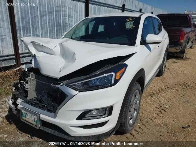 KM8J23A4XKU003755 Hyundai Tucson Essential