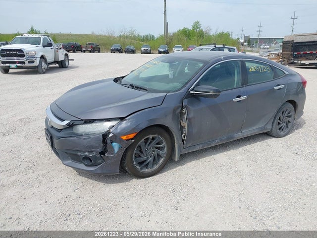 20261223 :رقم المزاد ، 2HGFC1F97GH109088 vin ، 2016 Honda Civic Touring مزاد بيع