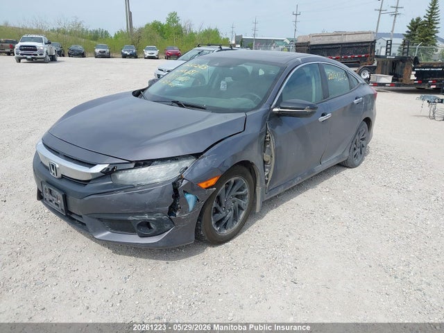 20261223 :رقم المزاد ، 2HGFC1F97GH109088 vin ، 2016 Honda Civic Touring مزاد بيع