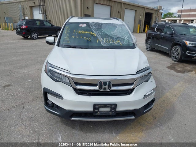 2022 Honda Pilot Touring მანქანა იყიდება აუქციონზე, vin: 5FNYF6H67NB507841, აუქციონის ნომერი: 20263449