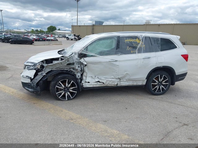 2022 Honda Pilot Touring მანქანა იყიდება აუქციონზე, vin: 5FNYF6H67NB507841, აუქციონის ნომერი: 20263449