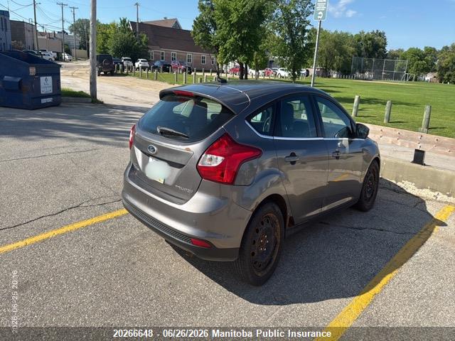 20266648 :رقم المزاد ، 1FAHP3N26CL171080 vin ، 2012 Ford Focus Titanium مزاد بيع