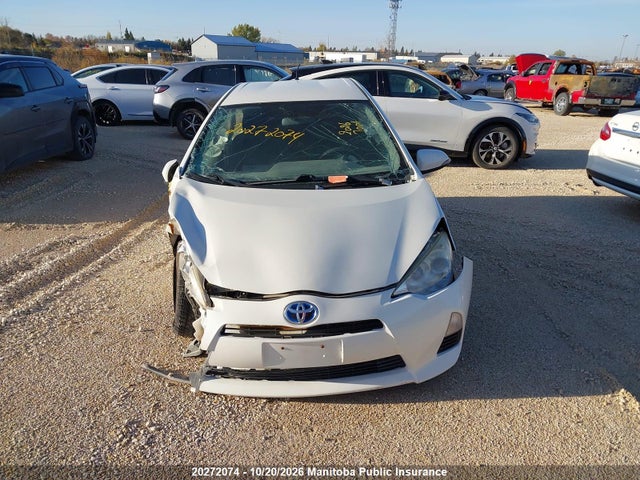 JTDKDTB36E1080699 Toyota PRIUS C