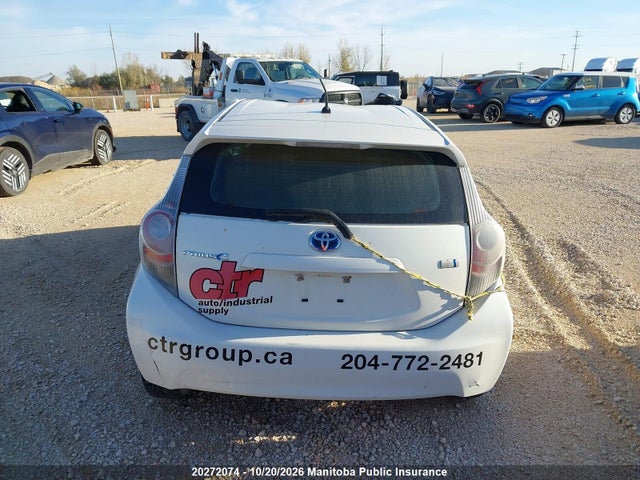 JTDKDTB36E1080699 Toyota PRIUS C