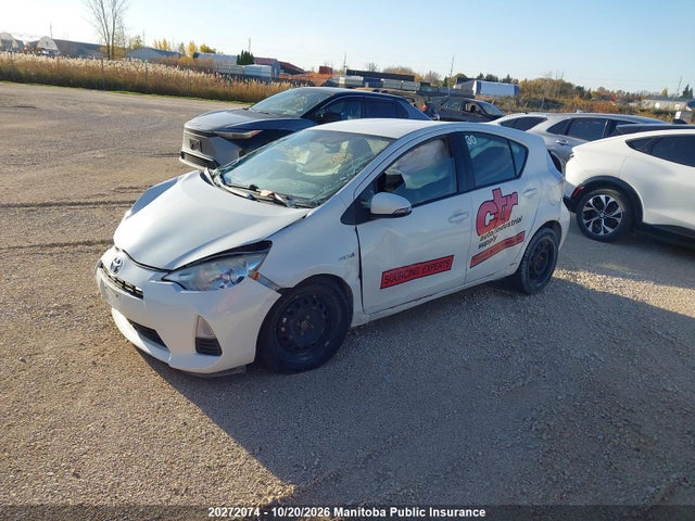 JTDKDTB36E1080699 Toyota PRIUS C