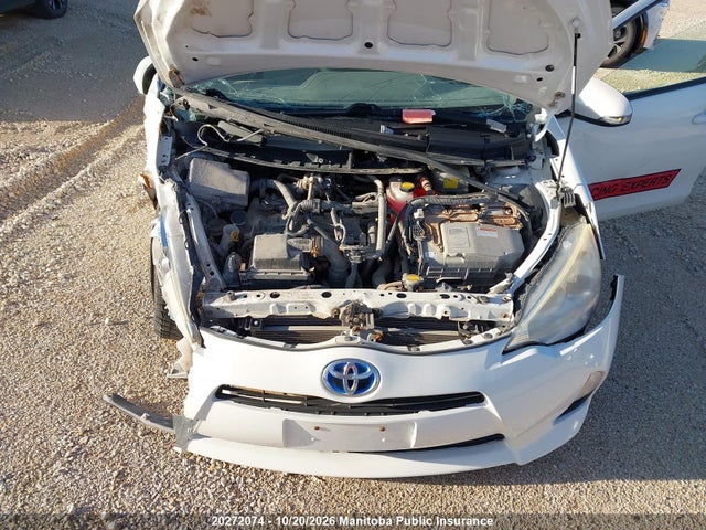 JTDKDTB36E1080699 Toyota PRIUS C