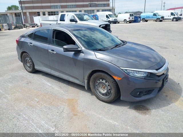Auction sale of the 2016 Honda Civic Touring, vin: 2HGFC1F94GH111221, lot number: 20272620