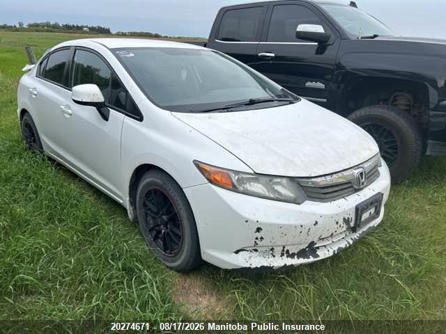 20274671 :رقم المزاد ، 2HGFB2F42CH061068 vin ، 2012 Honda Civic Lx مزاد بيع