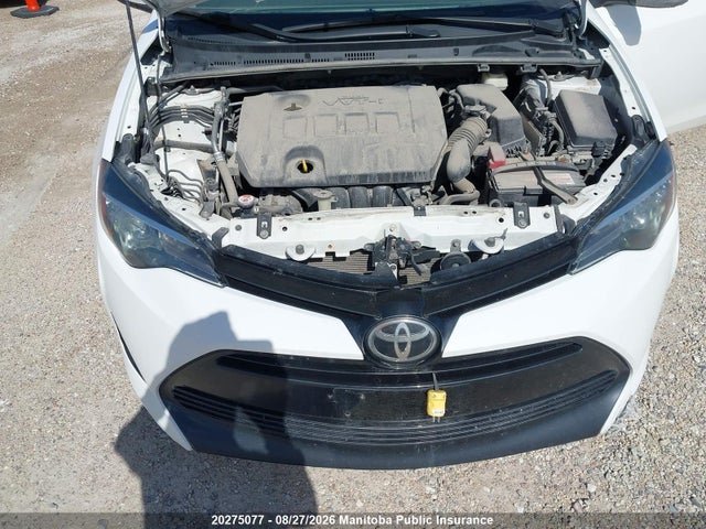 2T1BURHE9JC110571 Toyota COROLLA LE