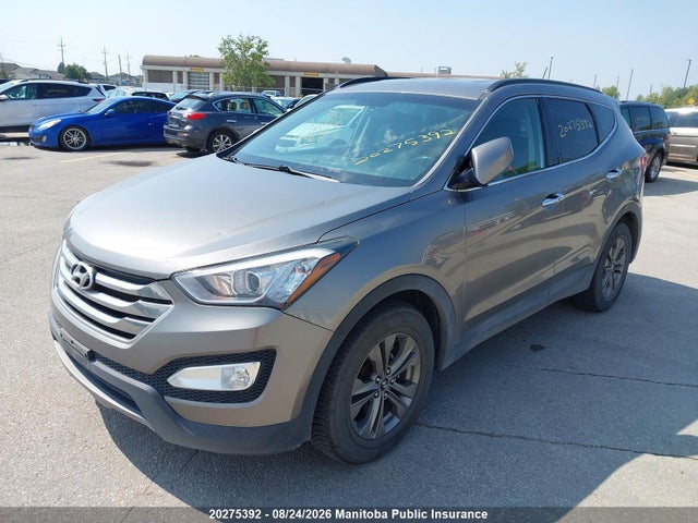 2014 Hyundai Santa Fe 2.4 Premium მანქანა იყიდება აუქციონზე, vin: 5XYZUDLB1EG160499, აუქციონის ნომერი: 20275392