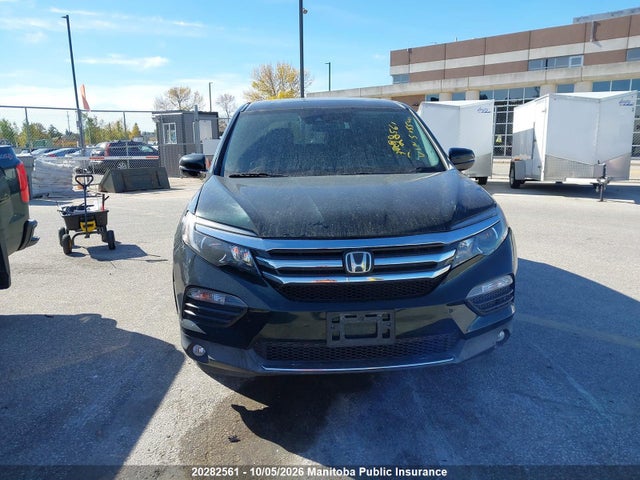 Продажа на аукционе авто 2017 Honda Pilot Touring, vin: 5FNYF6H99HB505541, номер лота: 20282561
