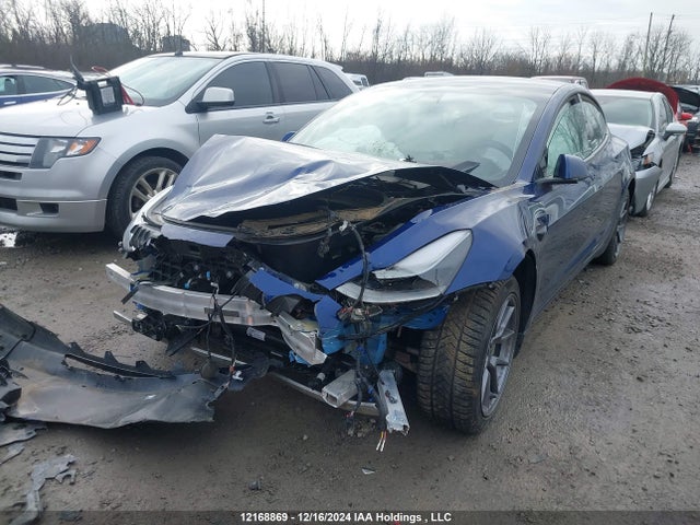 5YJ3E1EA6NF355138 Tesla MODEL 3