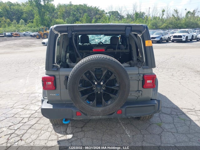 Auction sale of the 2023 Jeep Wrangler 4xe Unlimited Sahara, vin: 1C4JJXP63PW613497, lot number: 12203032