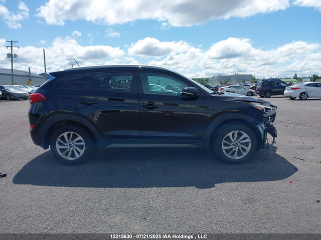 KM8J33A40GU052208 Hyundai Tucson