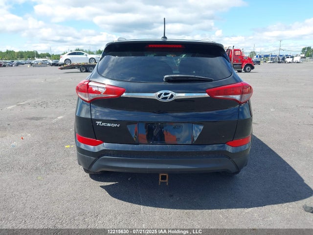 KM8J33A40GU052208 Hyundai Tucson