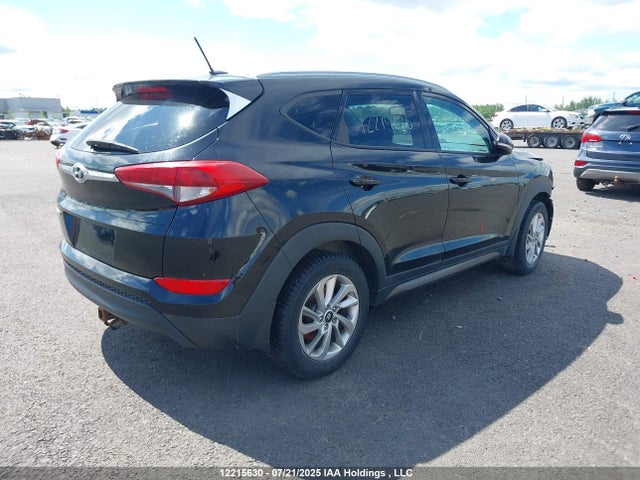 KM8J33A40GU052208 Hyundai Tucson