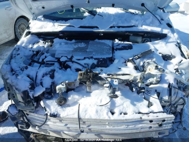 JTDKAMFP7M3164738 Toyota Prius