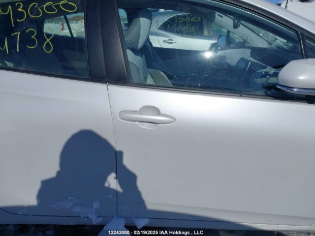 JTDKAMFP7M3164738 Toyota Prius
