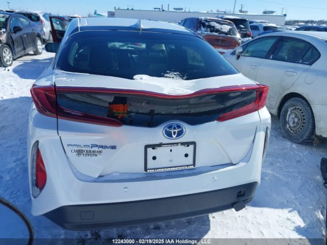 JTDKAMFP7M3164738 Toyota Prius