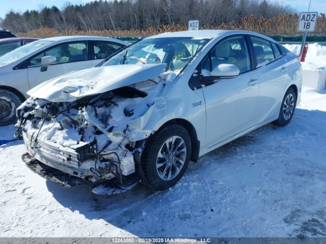 JTDKAMFP7M3164738 Toyota Prius