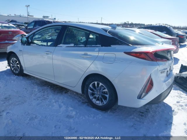 JTDKAMFP7M3164738 Toyota Prius
