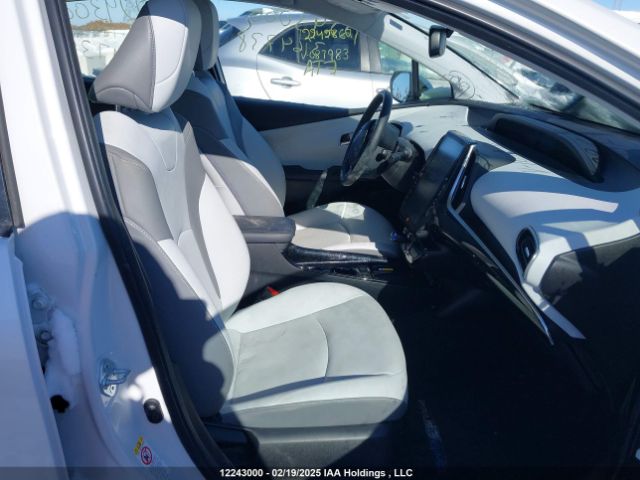 JTDKAMFP7M3164738 Toyota Prius