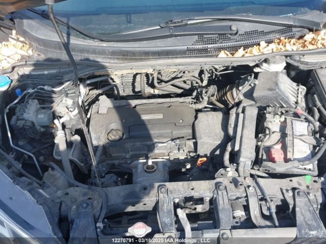 2HKRM4H36GH125552 Honda CR-V LX