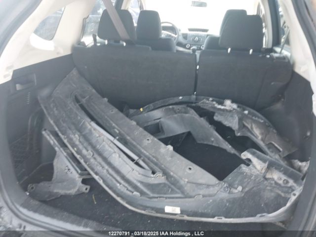 2HKRM4H36GH125552 Honda CR-V LX