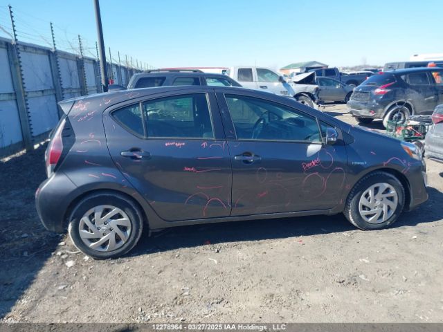 JTDKDTB34F1587392 Toyota PRIUS C
