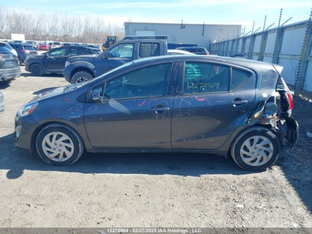JTDKDTB34F1587392 Toyota PRIUS C