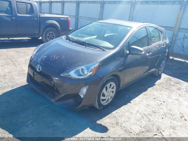 JTDKDTB34F1587392 Toyota PRIUS C