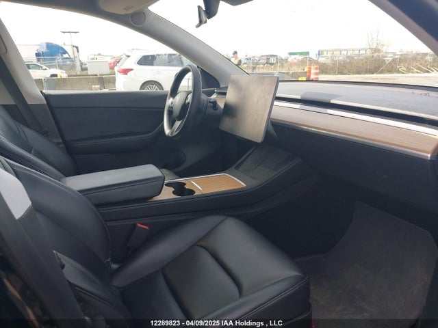 5YJYGAEE9MF253057 Tesla 2021