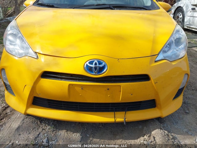 JTDKDTB37E1063877 Toyota PRIUS C
