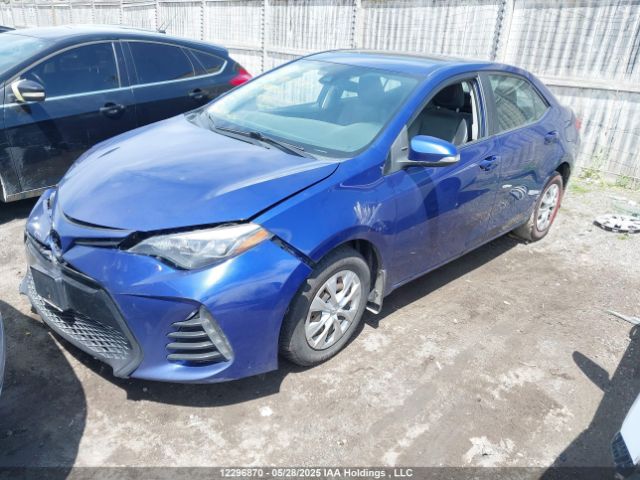 2T1BURHE4KC202995 Toyota Corolla
