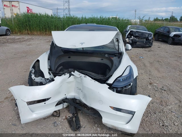12310302 :رقم المزاد ، 5YJ3E1EAXNF250246 vin ، 2022 Tesla Model 3 مزاد بيع