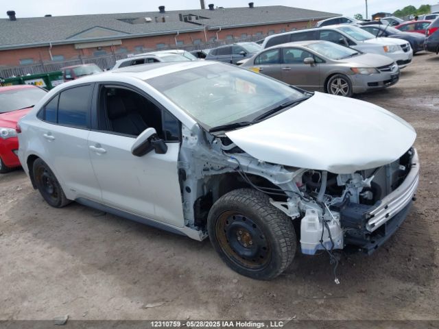 JTDBDMHE9PJ003052 Toyota Corolla Hybrid