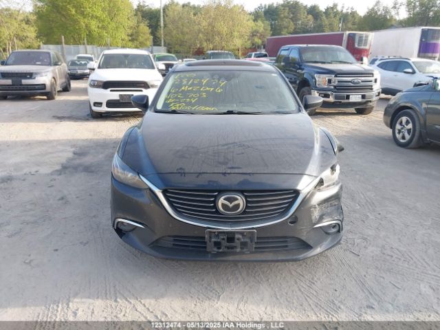 JM1GJ1W53G1402703 Mazda py