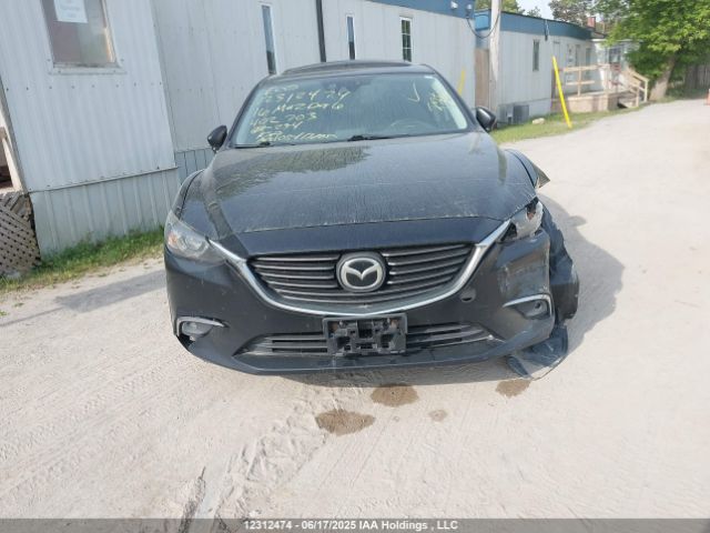 JM1GJ1W53G1402703 Mazda py