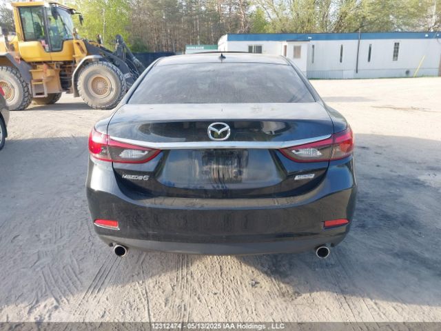 JM1GJ1W53G1402703 Mazda py