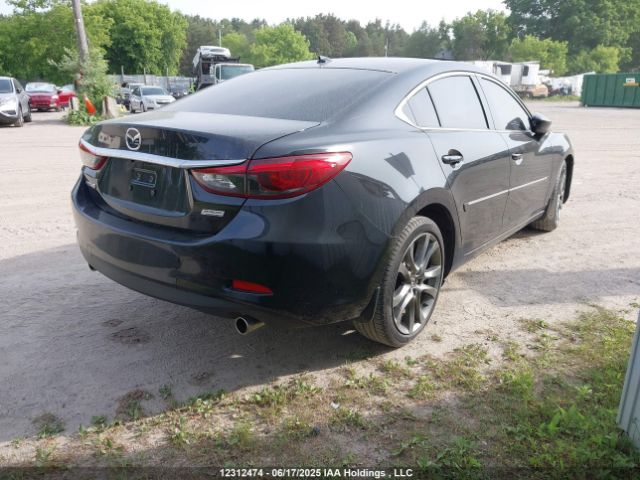 JM1GJ1W53G1402703 Mazda py