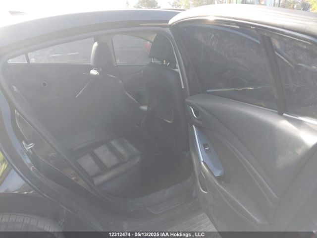 JM1GJ1W53G1402703 Mazda py