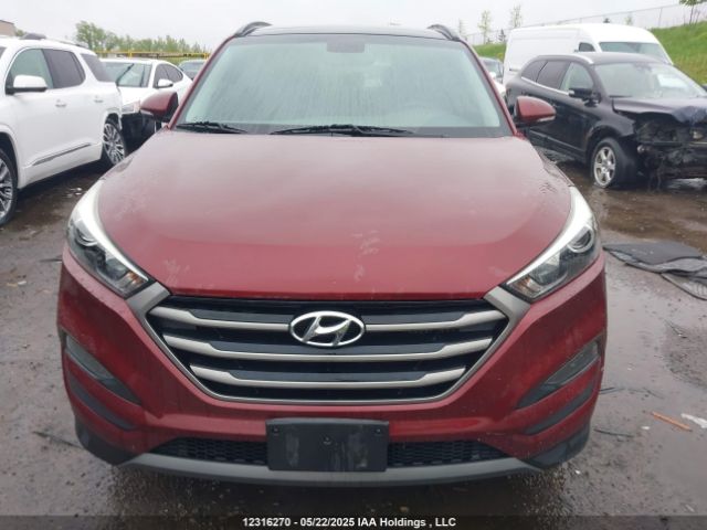KM8J3CA23GU028273 Hyundai Tucson