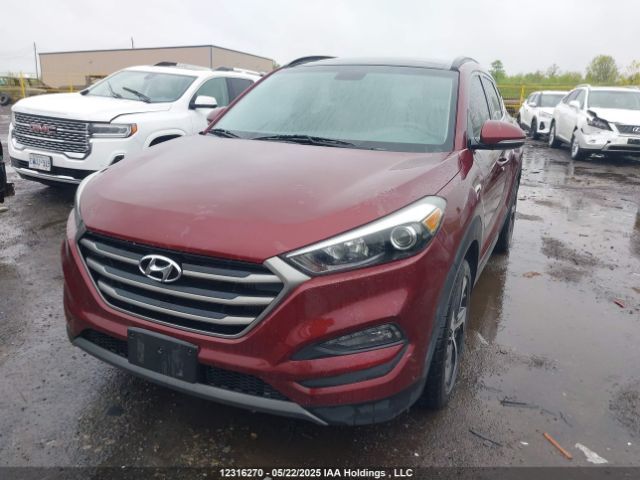 KM8J3CA23GU028273 Hyundai Tucson