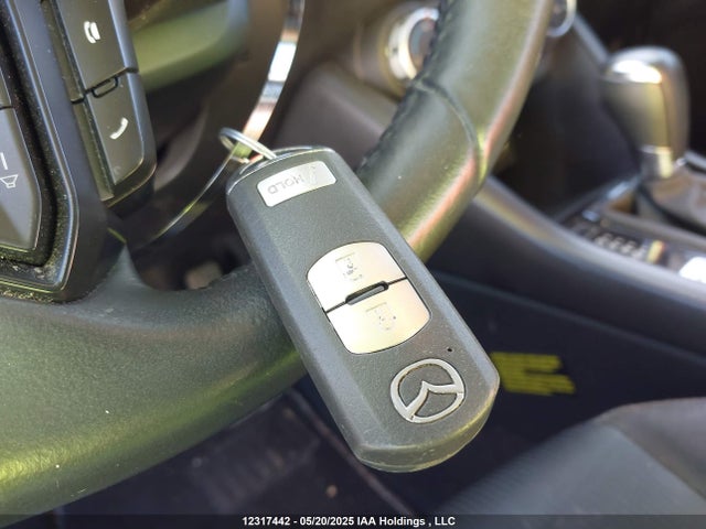 JM1DKFC78L1469522 Mazda pe