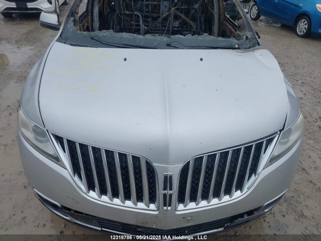 2LMDJ8JK6EBL10561 Lincoln 2014